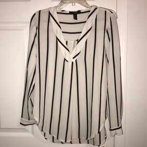 Black and white striped v-neck top